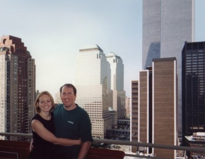 Brian and Christina Stanton on their 24th floor terrace just two weeks before the 9/11 attacks. The view is the Twin Towers, just six blocks away.