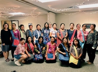 Burmese Christian refugees complete bags for sewing class at South Tulsa Baptist Church in Tulsa, Oklahoma. 