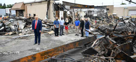 US President Donald Trump tours an area affected by civil unrest in Kenosha, Wisconsin on September 1, 2020. Trump said Tuesday on a visit to protest-hit Kenosha, Wisconsin that recent anti-police demonstrations in the city were acts of "domestic terror" committed by violent mobs. 