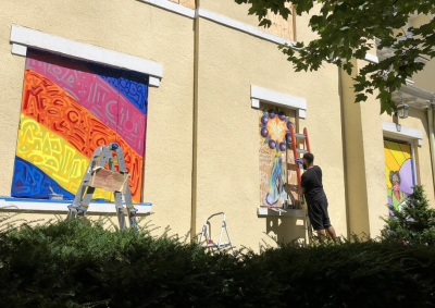 In September 2020, a group of volunteers painted murals on the protective plywood panels placed at St. John's Episcopal Church in Washington, D.C. Racial justice was a major theme of the work. 