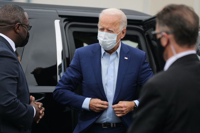 Democratic presidential nominee and former Vice President Joe Biden boards an airplane to travel to Michigan at the New Castle County Airport on September 09, 2020, in New Castle, Delaware. 