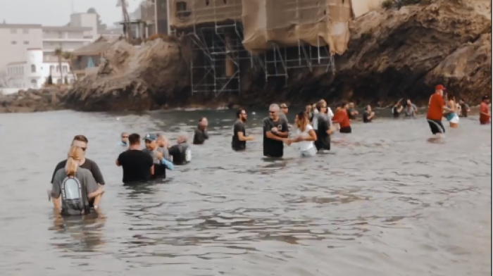 Worshipers gather for Calvary Chapel Church's Baptism 2020, held at Corona Del Mar State Beach, Sept. 12, 2020.