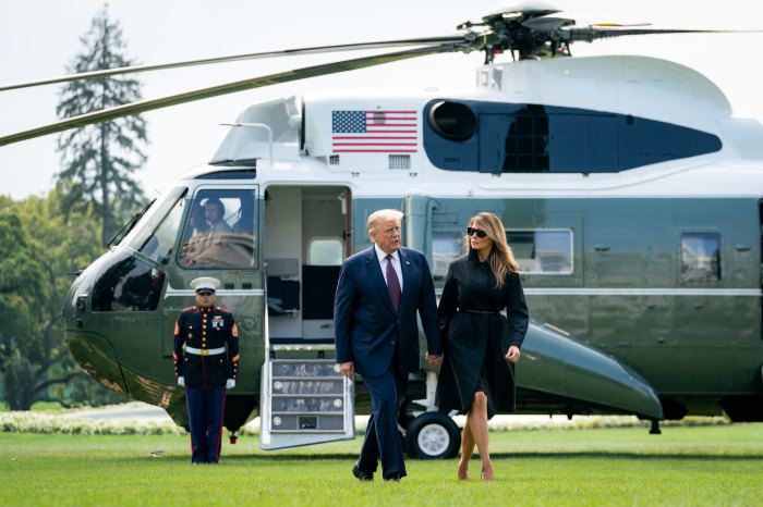 President Donald J. Trump and First Lady Melania Trump walk across the South Lawn of the White House after disembarking Marine One Friday, Sept. 11, 2020, concluding their trip to the Flight 93 National Memorial 19th Anniversary Observance in Shanksville, Pa. 