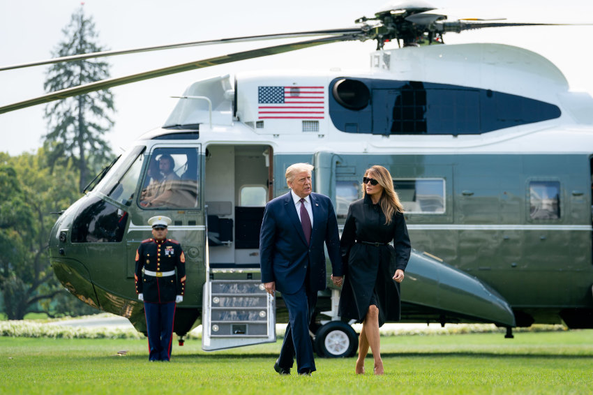 President Donald J. Trump and First Lady Melania Trump walk across the South Lawn of the White House after disembarking Marine One Friday, Sept. 11, 2020, concluding their trip to the Flight 93 National Memorial 19th Anniversary Observance in Shanksville, Pa.