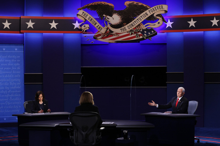 Democratic vice presidential nominee Sen. Kamala Harris, D-Calif., and U.S. Vice President Mike Pence participate in the vice presidential debate moderated by Washington Bureau Chief for USA Today Susan Page (C) at the University of Utah on October 7, 2020, in Salt Lake City, Utah. The vice presidential candidates only meet once to debate before the general election on November 3. 