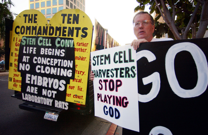 Protesters demonstrating on behalf of the anti-abortion California Life Coalition that opposes all embryonic stem cell research outside the Stem Cells and Regenerative Medicine: Commercial Implications for the Pharmaceutical and Biotech Industries meeting October 8, 2002, in San Diego, California. 