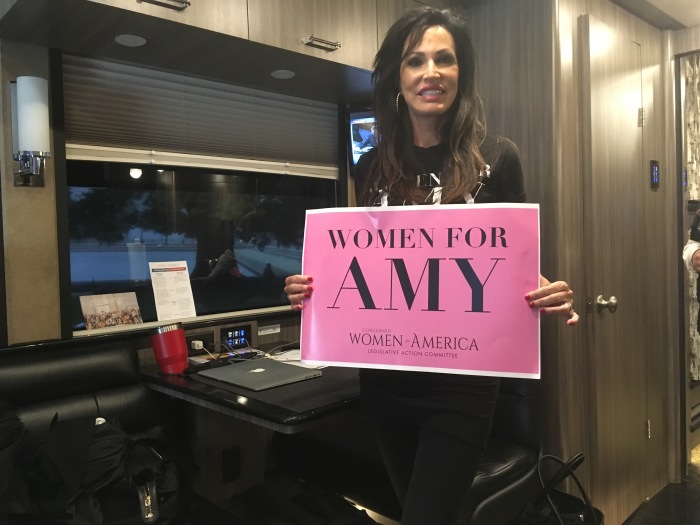 Penny Young Nance, president and CEO of Concerned Women for America, poses with a 'Women for Amy' sign on the 'Women for Amy' tour bus in Washington D.C. on Oct. 12, 2020. 