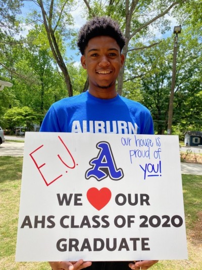 A picture of an Our House student who graduated from school at Auburn, AL. 