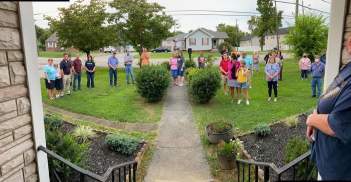 Members of Berea Baptist Church in Knoxville, Tenn., pray outside the home of their senior pastor, Michael Napier, as he battled the coronavirus on Aug. 31, 2020.