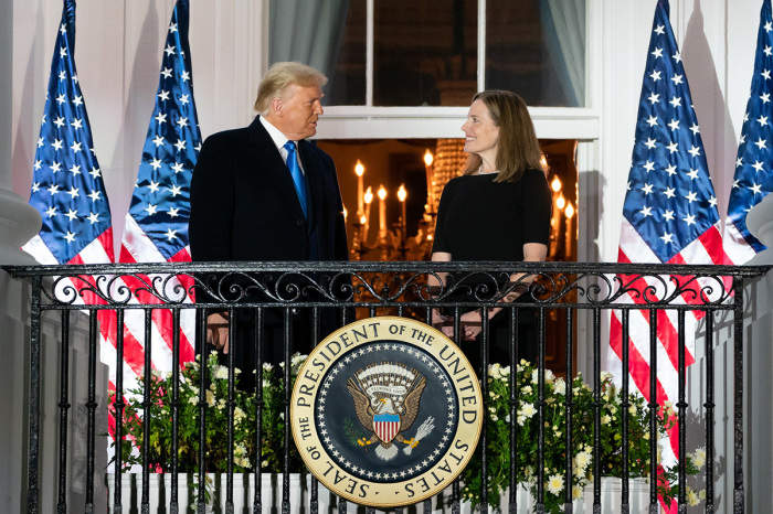 President Donald J. Trump and U.S. Supreme Court Associate Justice Amy Coney Barrett stand together on the Blue Room balcony Monday, Oct. 26, 2020, following Justice Barrett’s swearing-in ceremony on the South Lawn of the White House. 