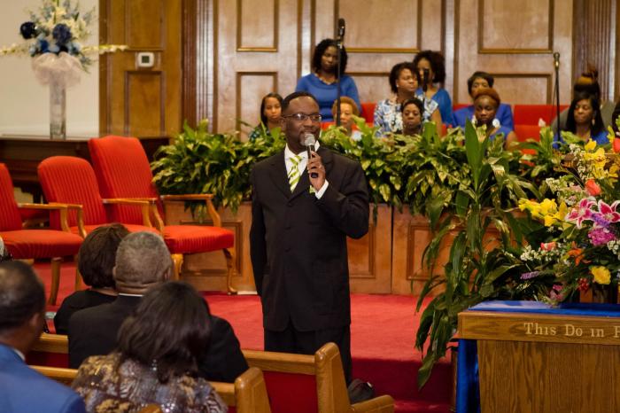 The late Bernard C. Yates ministers to his church in 2012.