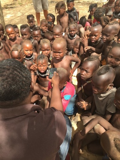 Himba children hearing the gospel through MP3 prayers provided by Samaritans Purse and Seed Company