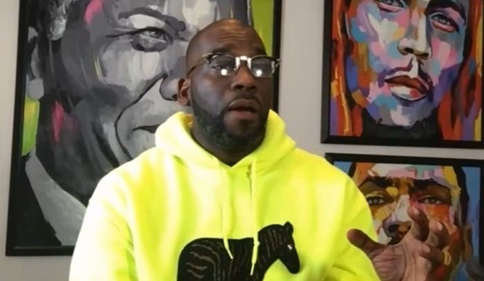 The Rev. Jamal Bryant, senior pastor of Atlanta's New Birth Missionary Baptist Church, takes to Facebook Live to explain his congregation's giveaway to those in need due to COVID-19 and urges members to vote in the Jan. 5, 2021, Georgia runoff election for U.S. Senate.