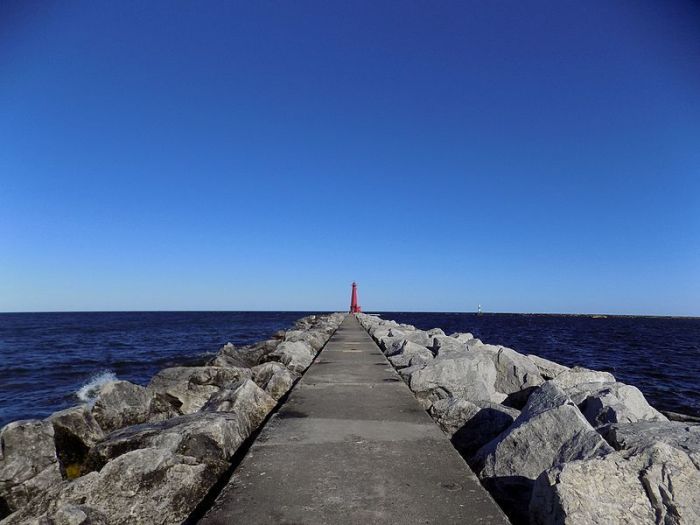 A light tower sits in the distance in Muskegon, Michigan, in June 2015.