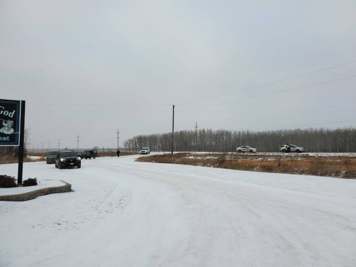 Police block the parking lot of Church of God Steinbach in the Canadian province of Manitoba, Nov. 29, 2020.