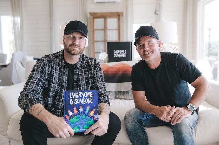 Bob Dalton and Chris Tomlin posing with the book Everyone is someone, 2020