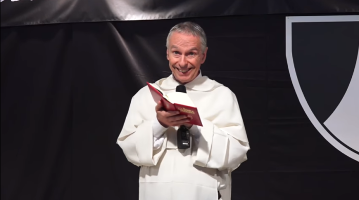 Father François-Marie Dermine, an exorcist, speaks at the Meeting of Rimini in 2015.