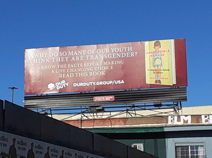 A billboard urging scrutiny of transgender medicine in youth is erected near Children's Hospital-LA