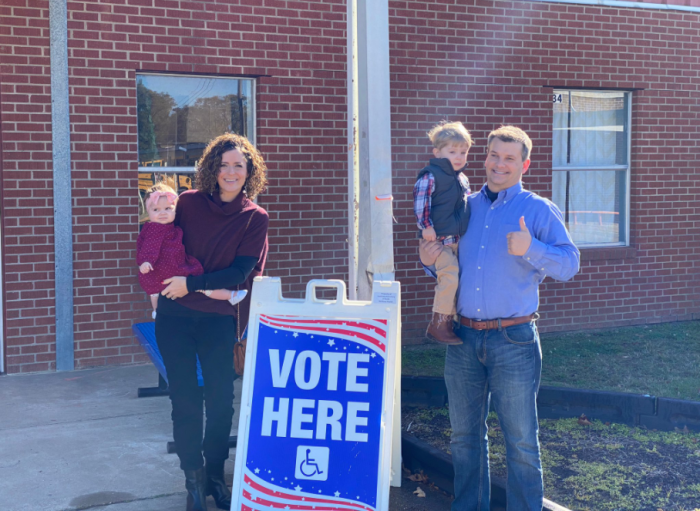 Congressman-elect Luke Letlow, R-La., stands outside Start Elementary School in Start, Louisiana, with his wife Julia and two children after casting his ballot for himself in the runoff election for Louisiana's 5th congressional district, Dec. 5, 2020.