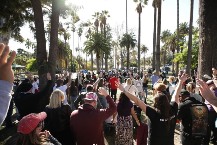 People gather at Echo Park in Los Angeles for the Let Us Worship event, Dec. 31, 2020.
