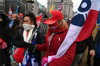 Supporters of U.S. President Donald Trump hold a rally as they protest the upcoming electoral college certification of Joe Biden as President in Washington, D.C. on January 5, 2021. 
