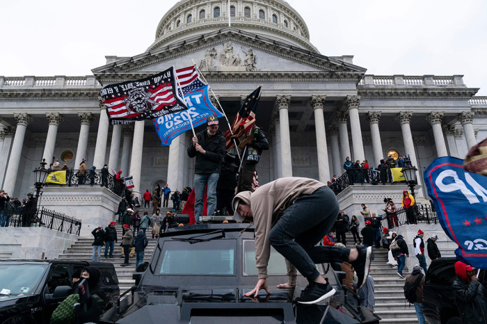 Supporters of U.S. President Donald Trump protest outside the U.S. Capitol on January 6, 2021, in Washington, D.C. Demonstrators breached security and entered the Capitol as Congress debated the 2020 presidential election Electoral Vote Certification. 