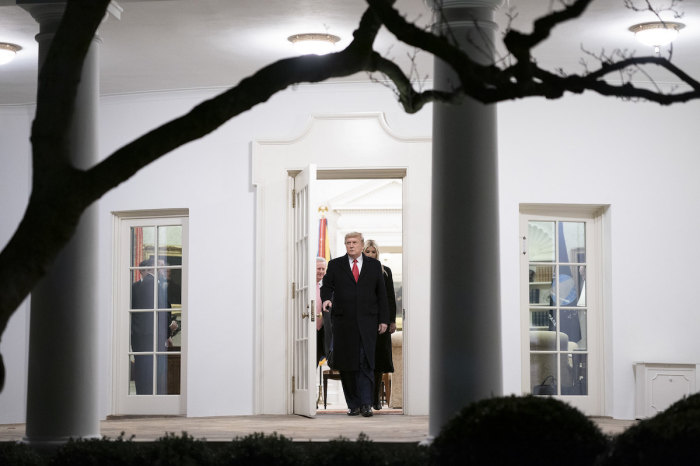 President Donald J. Trump walks from the Oval Office to board Marine One on the South Lawn of the White House Tuesday, Jan. 4, 2021, en route to Joint Base Andrews, Md. to begin his trip to Georgia. 