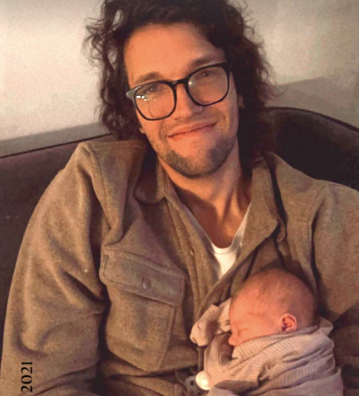 Luke Smallbone poses with his daughter, Evie, 2021