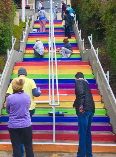 Volunteers with the Peninsula Multifaith Coalition painting rainbow steps at a local elementary school as part of the 2020 Martin Luther King, Jr. Day of Service. 