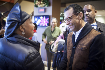 Pastor A.R. Bernard talks with a church member at a Sunday service at Christian Cultural Center in Brooklyn, New York. 