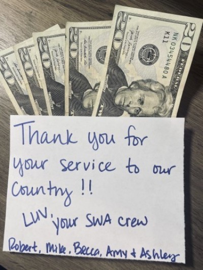 A Southwest Airlines flight crew returns a sailor's lost wallet after adding a $100 and a sweet note. 