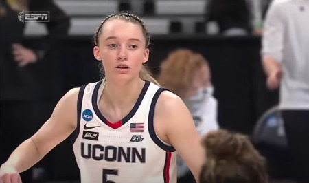 UConn star Paige Bueckers celebrates after making a shot in a victory against the University of Iowa in the Sweet 16 of the NCAA Tournament on March 27, 2021.