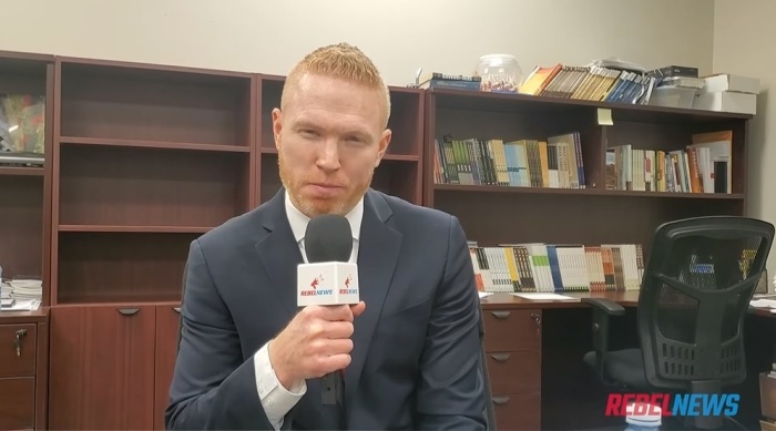 Pastor James Coates of GraceLife Church in Edmonton, Alberta, speaks to the Canadian news outlet Rebel News on March 29, 2021. 