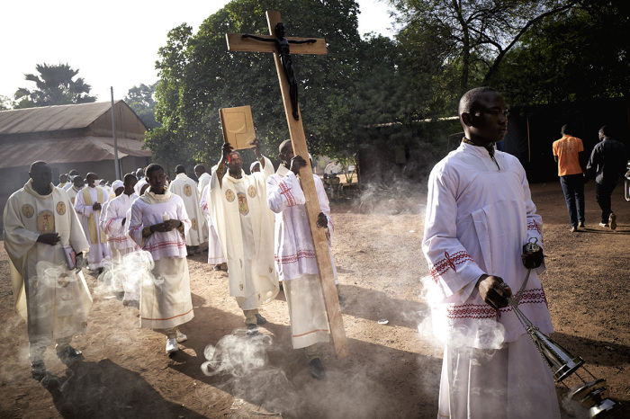 Altar servers are seen during a procession before the liturgy in the occasion of the National Pilgrimage in Kita on November 22, 2020. Since 1966, when the bishops of Mali decided to make Kita the site of a National Pilgrimage, the faithful made the journey to the holy sanctuary of Kita, where the statue venerated as Notre Dame de Mali is situated. The central theme of this year's gathering is the reconciliation of Mali and the freedom of Sister Gloria, who was kidnapped three years before in Sikasso. 