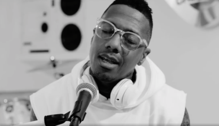 "No Weapon" by Nick Cannon and featuring Kierra Sheard-Kelly