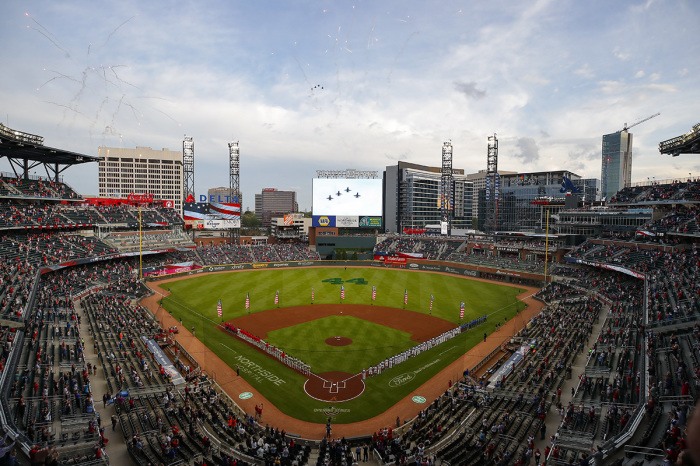 A general view of Truist Park as the National Anthem is performed with a flyover prior to an MLB game against the Philadelphia Phillies at Truist Park on April 9, 2021, in Atlanta, Georgia. 