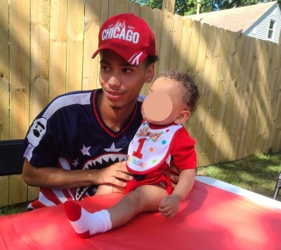 The late Daunte Wright, 20, with his toddler son who will celebrate his second birthday in July 2021.