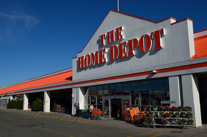 A shopper pushes a cart outside the Home Depot in Markham, Ontario, Canada, in this undated photo. 