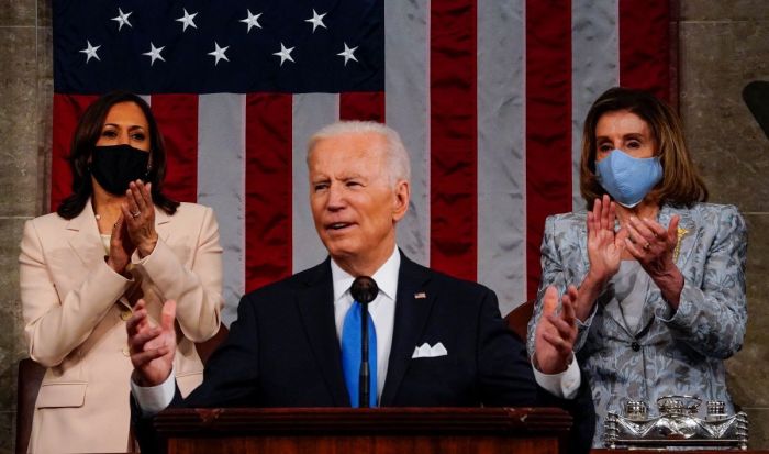 President Joe Biden addresses a joint session of Congress as Vice President Kamala Harris (L) and Speaker of the House U.S. Rep. Nancy Pelosi (R) look on in the House chamber of the U.S. Capitol April 28, 2021 in Washington, D.C. 