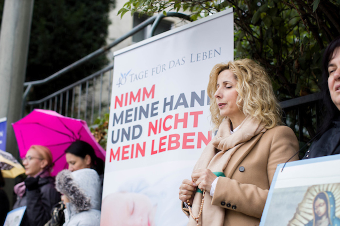 Pavica Vojnovi?, leader of a German chapter of 40 Days for Life, prays at a pro-life vigil. A German court denied the group's challenge to continue holding vigils outside Pro Familia, an abortion advisery center, on May 12, 2021.