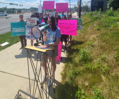 Pro-life activist Alyssa Thoburn, a high school senior and president of the Students for Life Chapter in Fairfax, Virginia, speaks at the Students for Life of America's #FireFauci rally in Bethesda, Maryland, June 10, 2021.