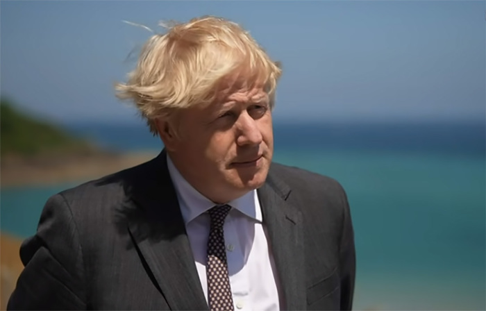 U.K. Prime Minister Boris Johnson speaks with ITV News' politics editor Robert Peston in an interview in Cornwall, England, on June 12, 2021.