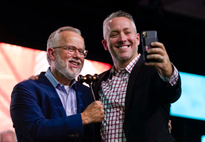 Newly elected Southern Baptist Convention president Ed Litton and outgoing president J.D. Greear take a selfie after Greear pounded the gavel for the last time June 16, 2021, to close the SBC Annual Meeting. Litton will open the 2022 SBC Annual Meeting in Anaheim, Ca., with the pound of the gavel.