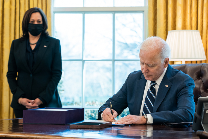 President Joe Biden joined by Vice President Kamala Harris in the Oval Office of the White House in Washington, D.C., on March 11, 2021. 