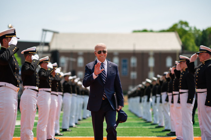 President Joe Biden walks through an Honor Guard Cordon at the conclusion of the Coast Guard Academy Commencement on Wednesday, May 19, 2021, at the Coast Guard Academy Cadet Memorial Field in New London, Conn.