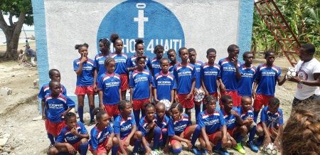 Haitian children in soccer jerseys at Anchor4Haiti.