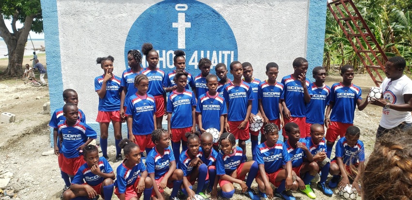 Haitian children in soccer jerseys at Anchor4Haiti.