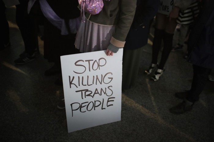 Demonstrators protest for transgender rights with a rally, march through the Loop and a candlelight vigil to remember transgender friends lost to murder and suicide on March 3, 2017 in Chicago, Illinois. 