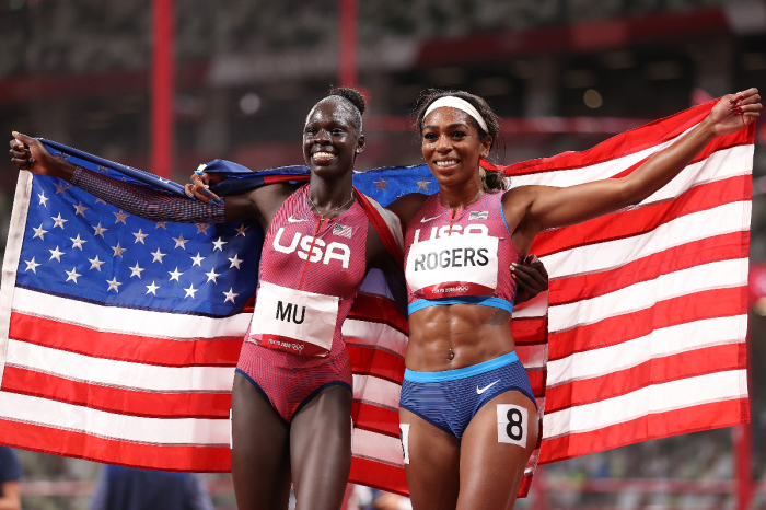 Gold medalist Athing Mu (L) of Team USA and bronze medalist Raevyn Rogers (R) of Team USA celebrate after the Women's 800-meter final on day 11 of the Tokyo 2020 Olympic Games at Olympic Stadium on Aug. 3, 2021 in Tokyo, Japan. 