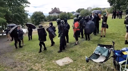 Antifa members assaulting a prayer and worship event in downtown Portland, Oregon.